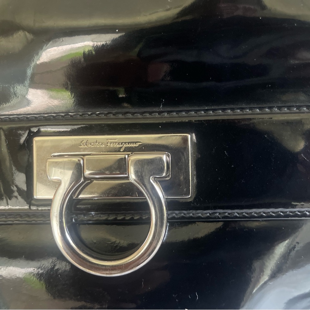 This bag is beautiful for people who like to carry big fancy handbags.